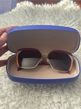 Emilio Pucci Purple Gradient Cat-Eye
Sunglasses with Orange Accents
